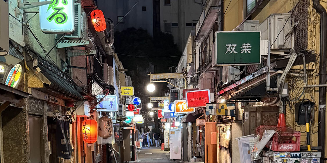 BSSC guests enjoying authentic ramen dinner in Shinjuku, Tokyo — part of our cultural and culinary Japan ski tour.