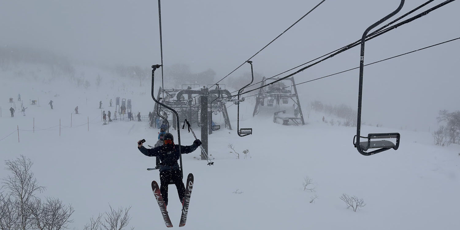 Niseko Annupuri pizza box chairlift view during final ski day, highlighting premium ski terrain on Japan tour.